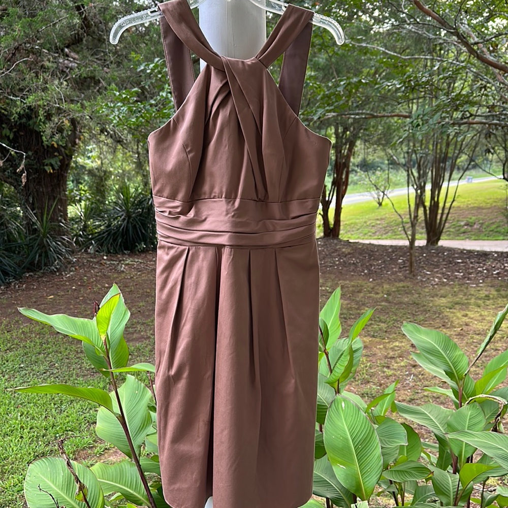 Stunning David’s Bridal size 8 taupe dress. With pockets & twist halter neckline